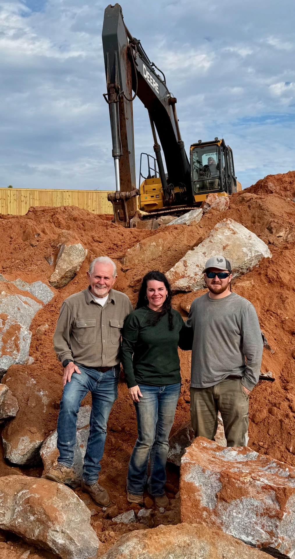 Three generations of the Rice family at a drilling and blasting job site